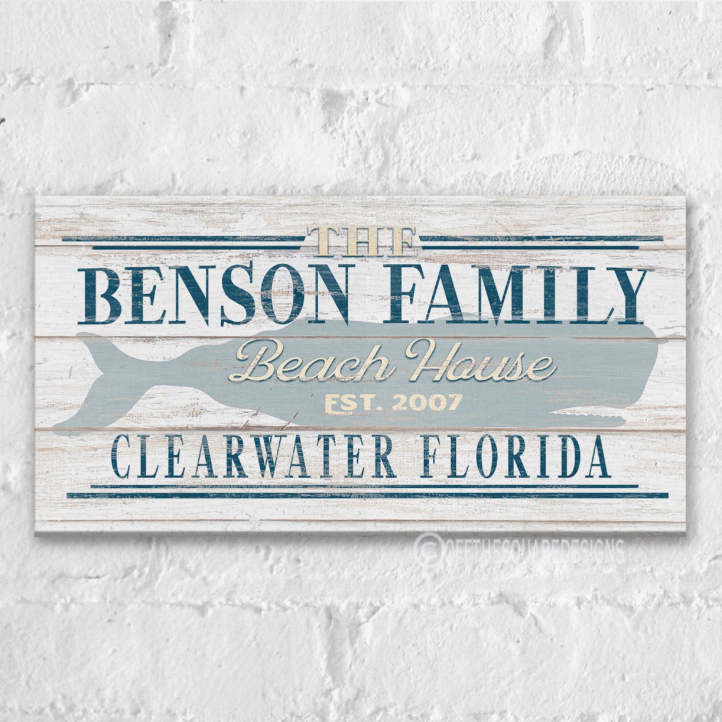 Personalized whale sign featuring Chatham Cape Cod family name on rustic white wall