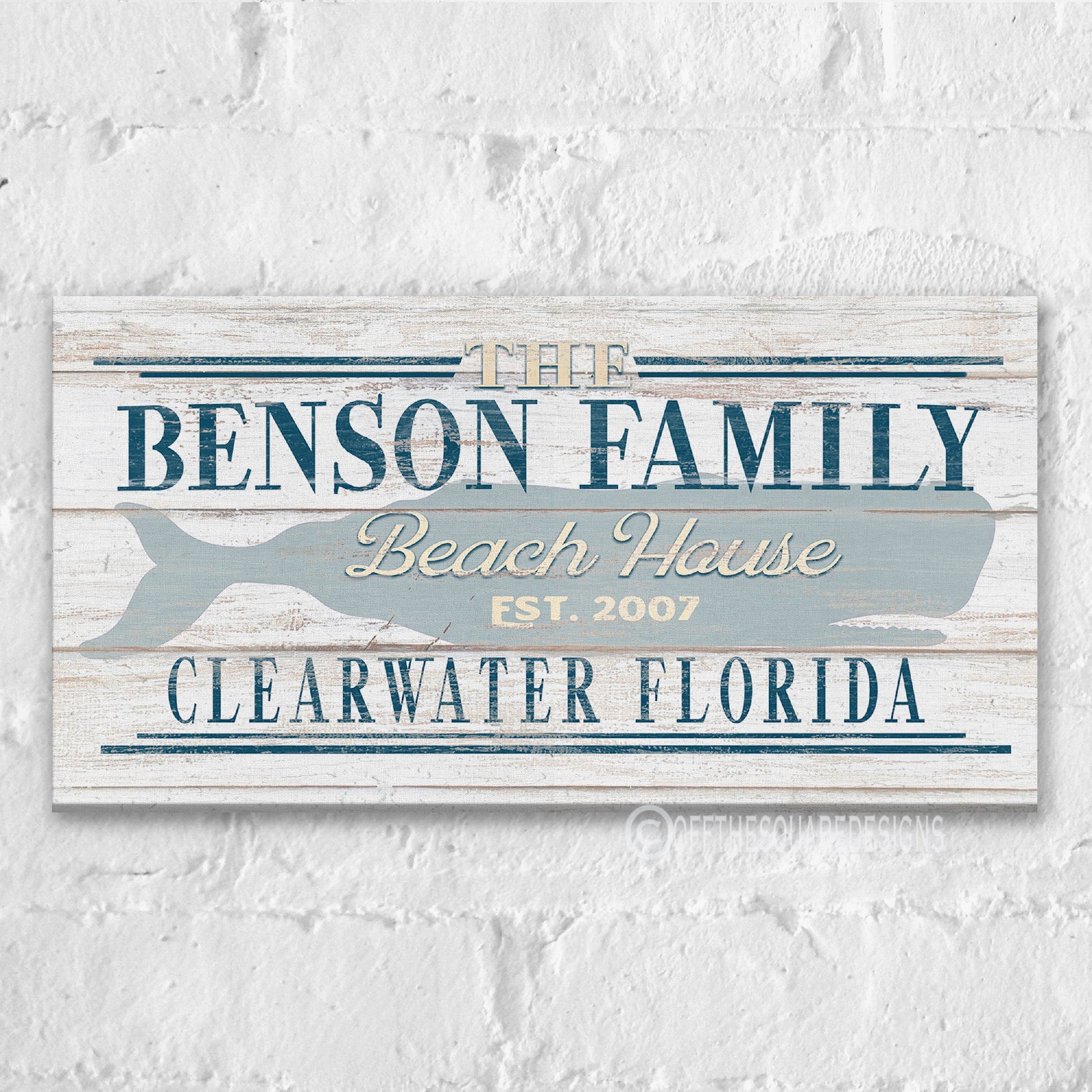 Personalized whale sign featuring Chatham Cape Cod family name on rustic white wall