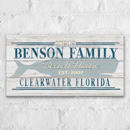 Personalized whale sign featuring Chatham Cape Cod family name on rustic white wall