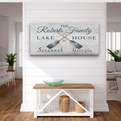 Coordinates oars sign in lakehouse setting with stone wall and rustic cabin atmosphere