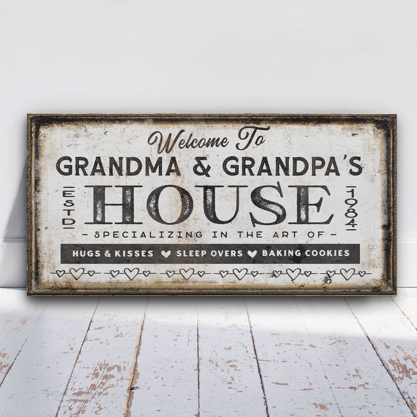 Grandparent gift canvas close-up showing personalized names and rustic wood frame detail