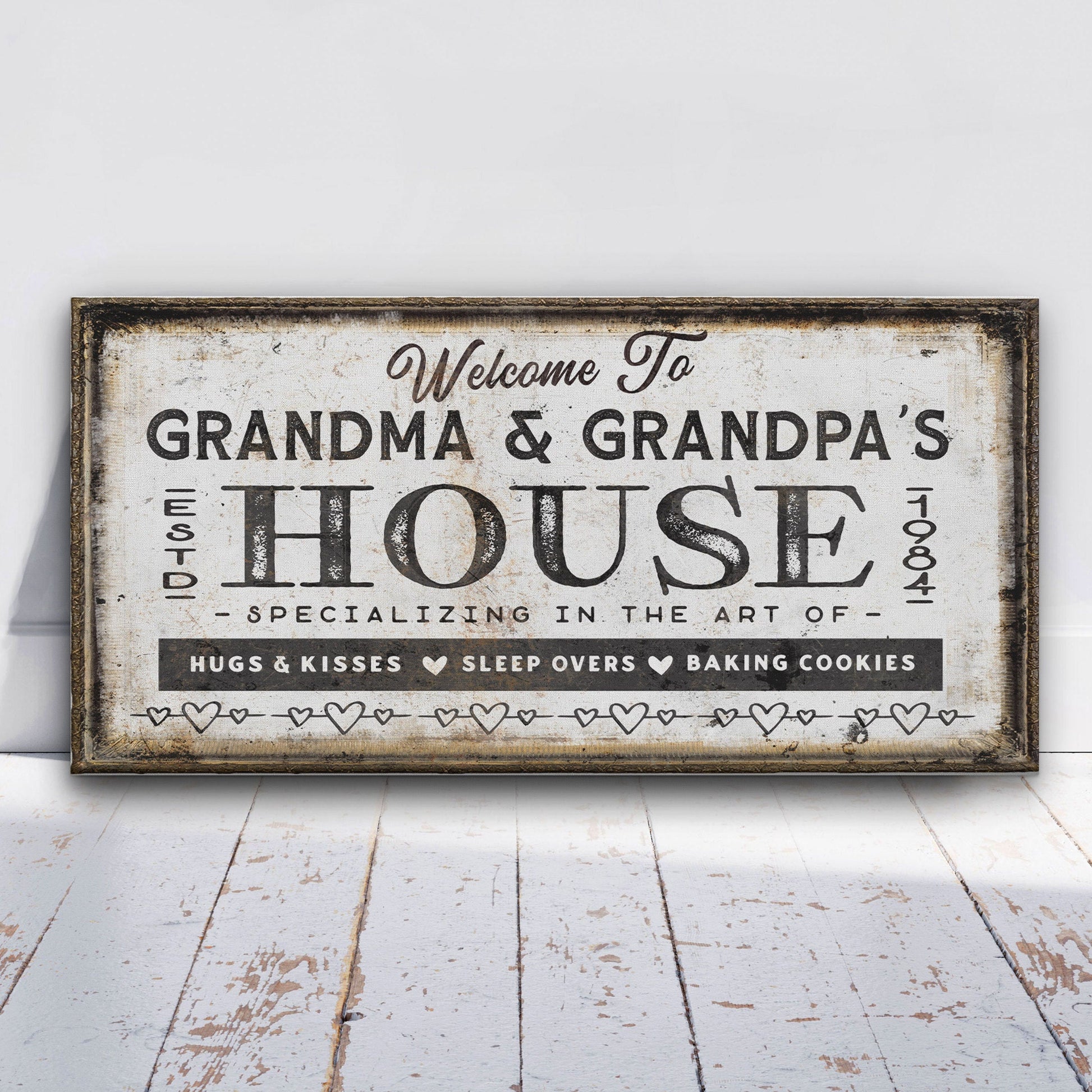 Grandparent gift canvas close-up showing personalized names and rustic wood frame detail
