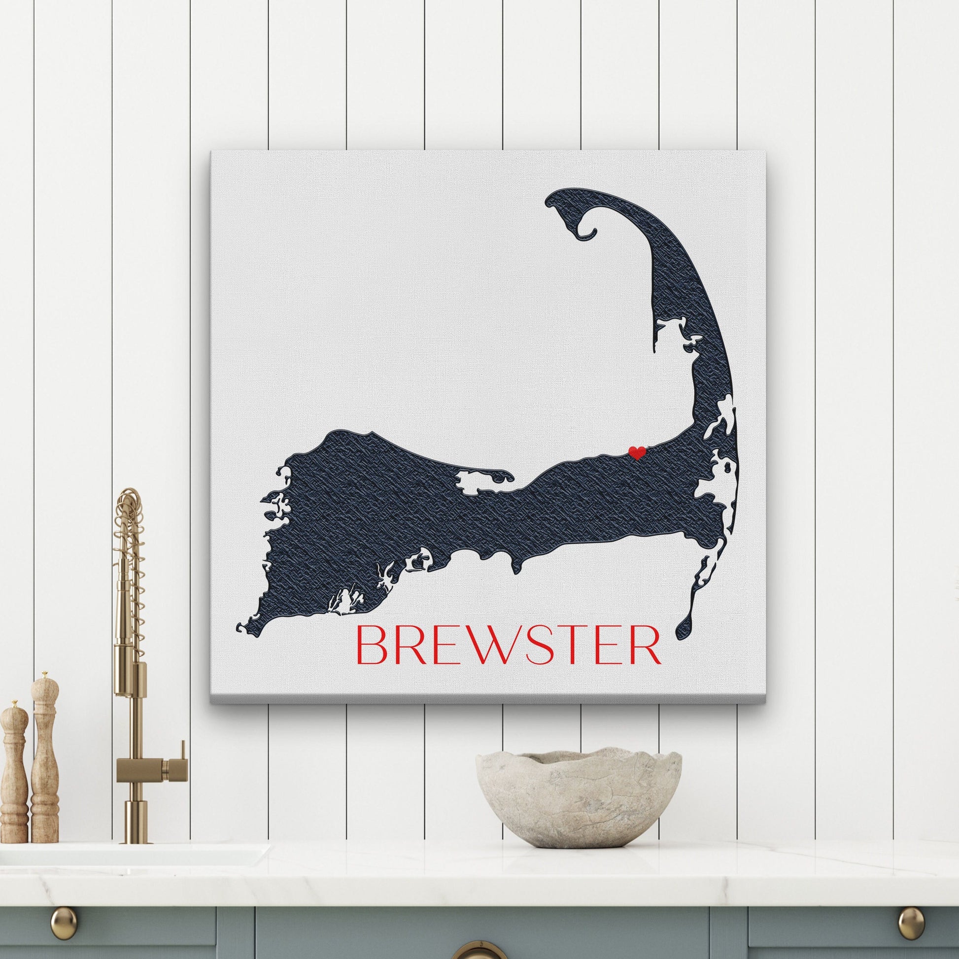 Personalized Cape Cod map sign featuring Brewster on kitchen shelf with coastal accessories