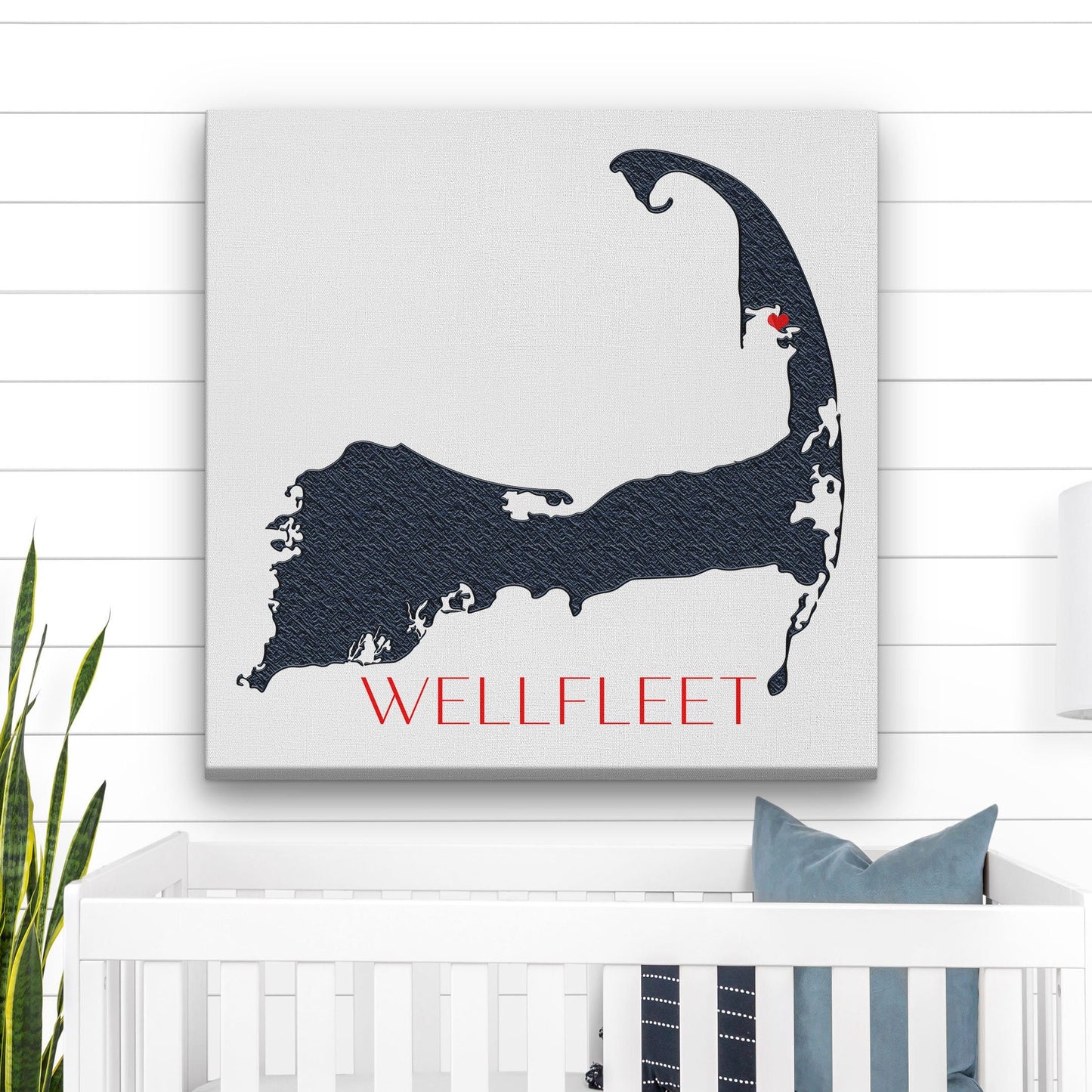 Personalized Cape Cod map art with Wellfleet displayed in nursery above white crib