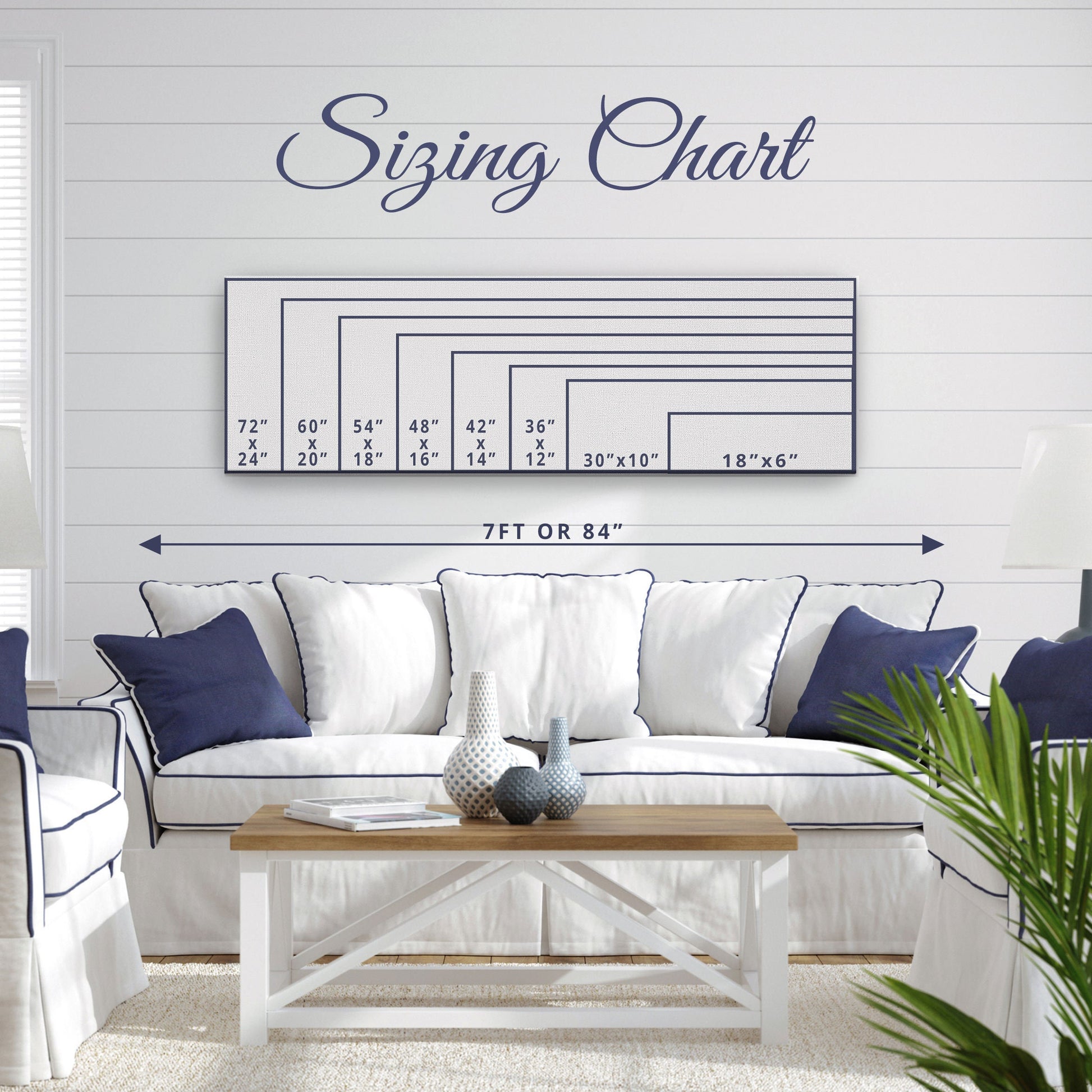 Personalized whale sign in gallery wall arrangement with mixed nautical prints and cohesive display