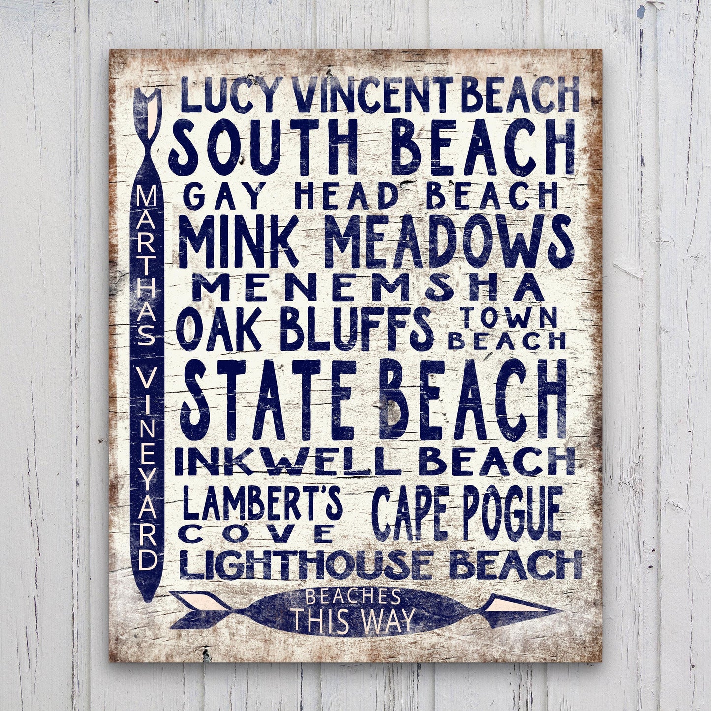 Marthas Vineyard beaches arrow sign with vintage wood look listing popular beach destinations