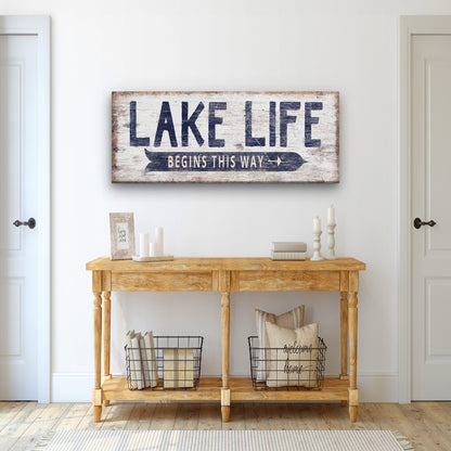 Lake directional canvas sign displayed in a home entryway